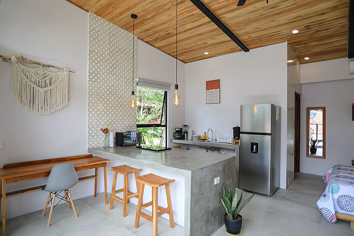 Work area and kitchenette inside a studio